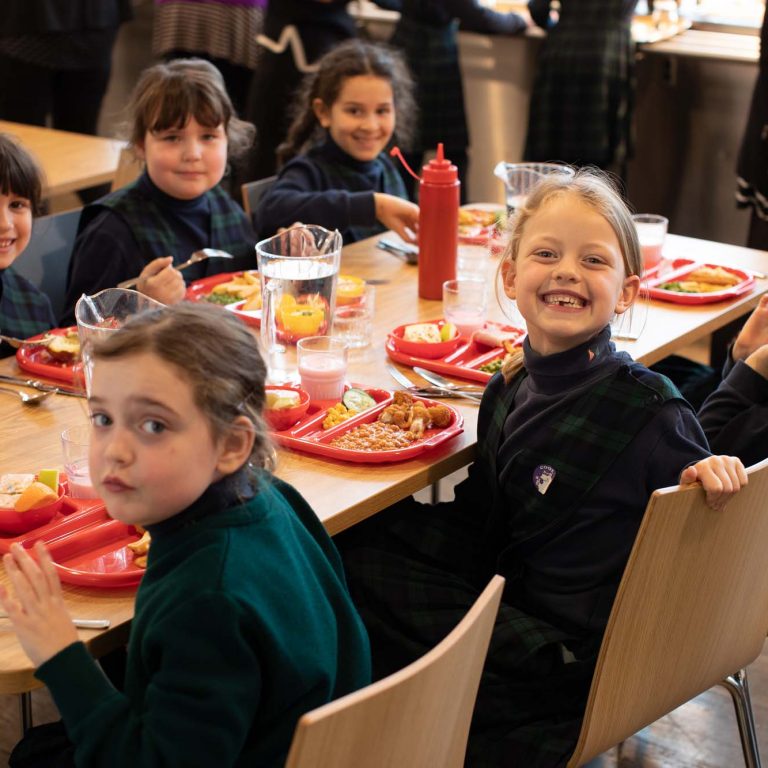 children sat at the lunch table