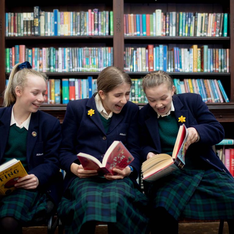 children reading books together