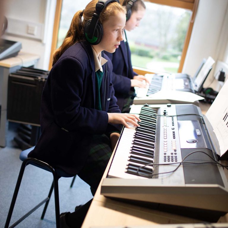 girl using a keyboard