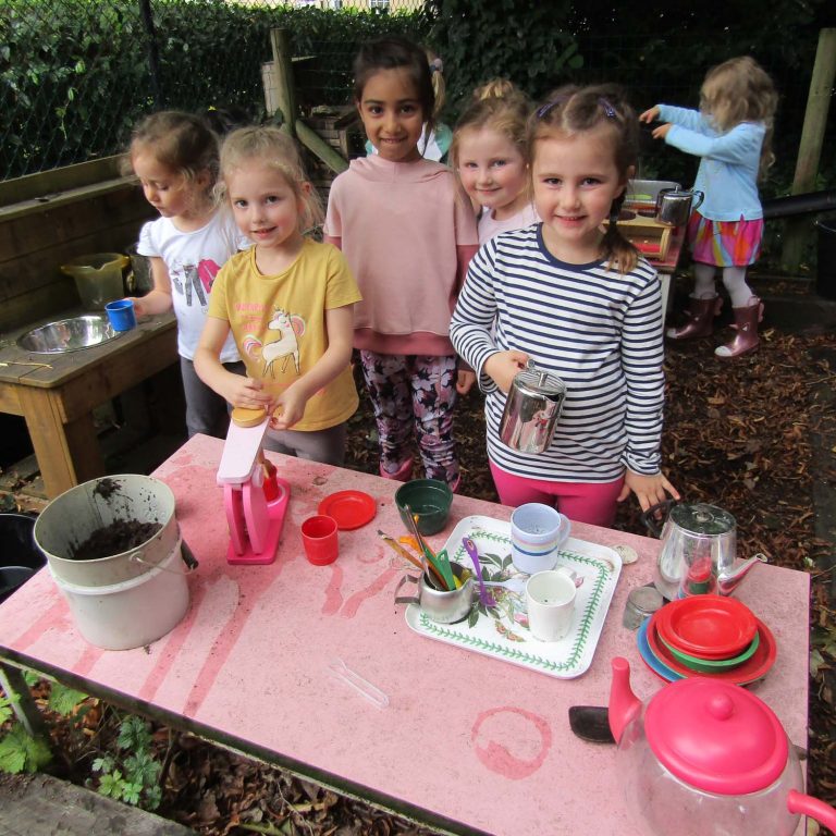 children cooking outside