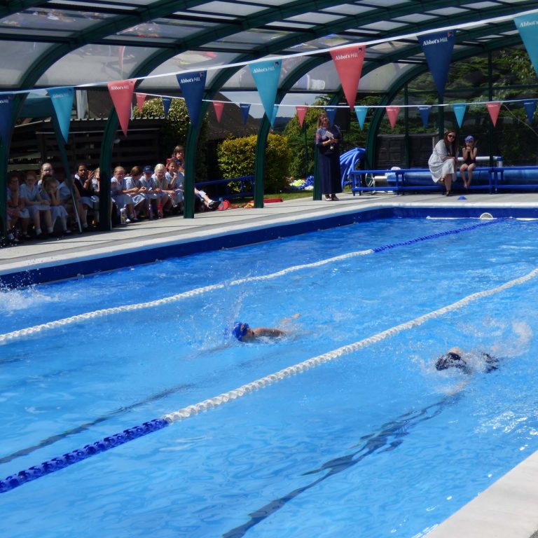 students in a swimming pool