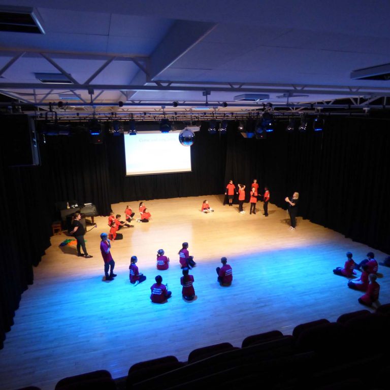 students in a rehearsal - top level view