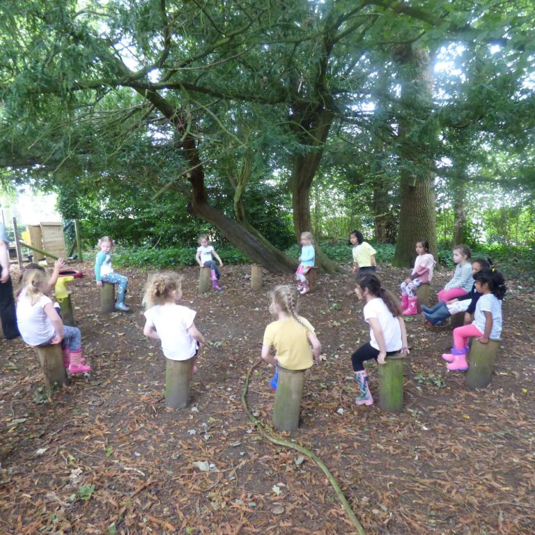 children sat in a circle