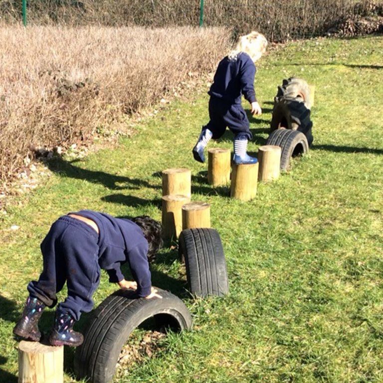pupils completing an obstacle course